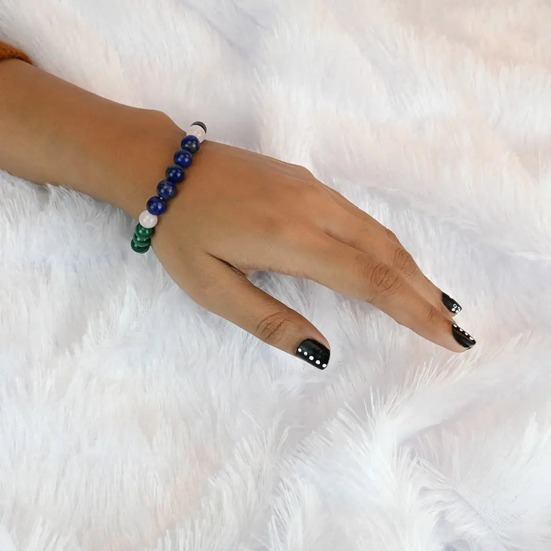 Woman wearing Vrishta Love Shield Bracelet on wrist