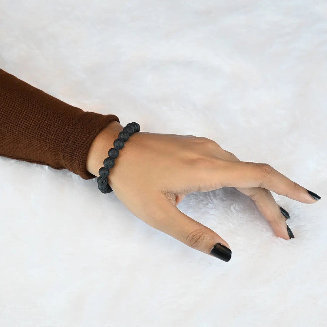 Woman wearing Vrishta Lava Bracelet on wrist