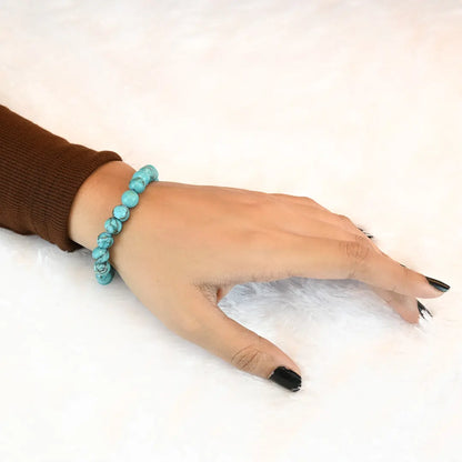 Woman wearing Vrishta Turquoise Bracelet on wrist