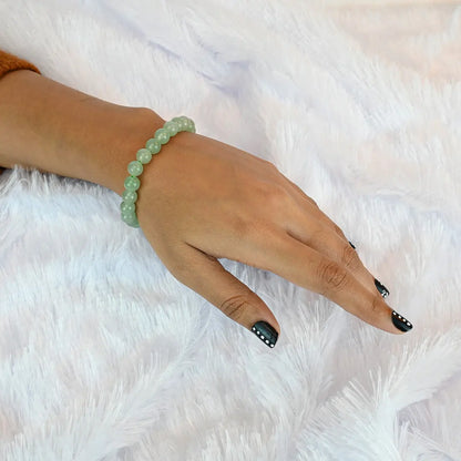 Woman wearing Vrishta Green Aventurine Bracelet on wrist