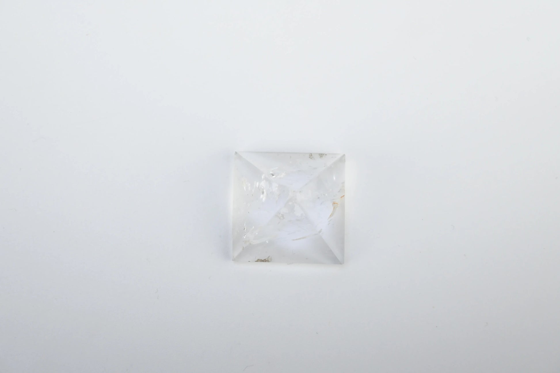 Vrishta Small Clear Quartz Pyramid displayed on white background