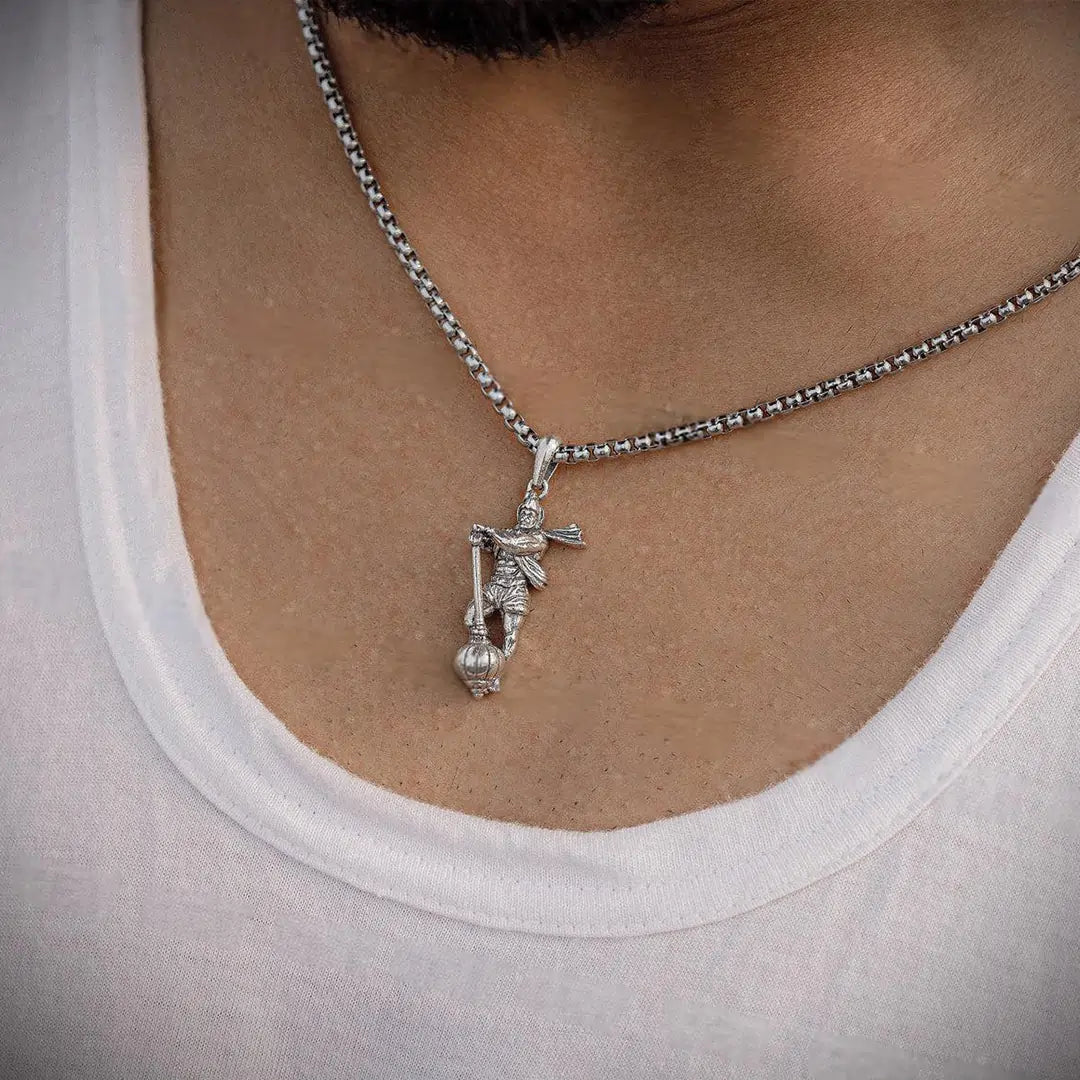 Close-up view of person wearing Vrishta Hanuman Ji With Gada Sterling Silver Pendant