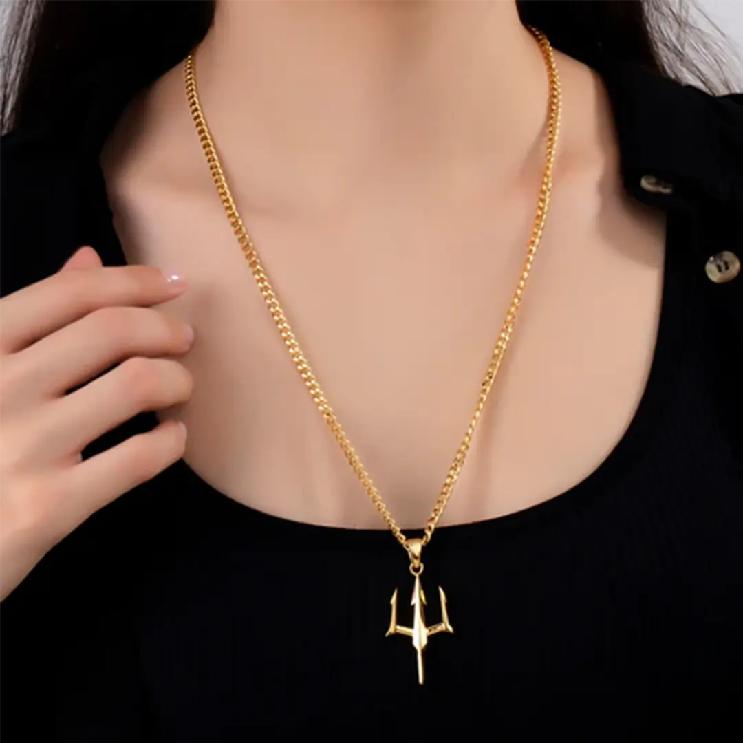Woman wearing Vrishta Trishul 22K Gold Plated Chain Pendant for spiritual protection and style